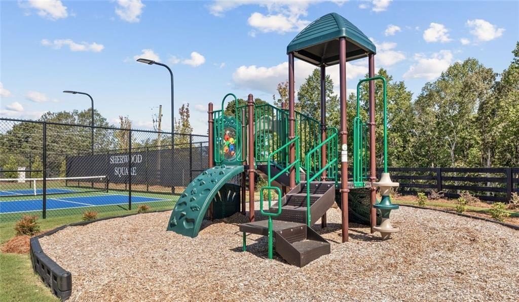 7357 Mulberry Trace Lane Hoschton, GA 30548 - Photo 17 of 19 a view of outdoor space with seating