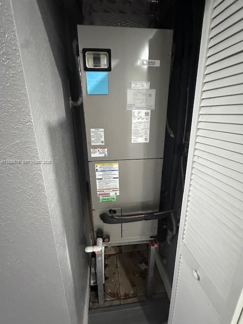 7100 Northwest 177th Street, Unit 100 Hialeah, FL 33015 - Photo 13 of 13 a view of entryway with wooden floor