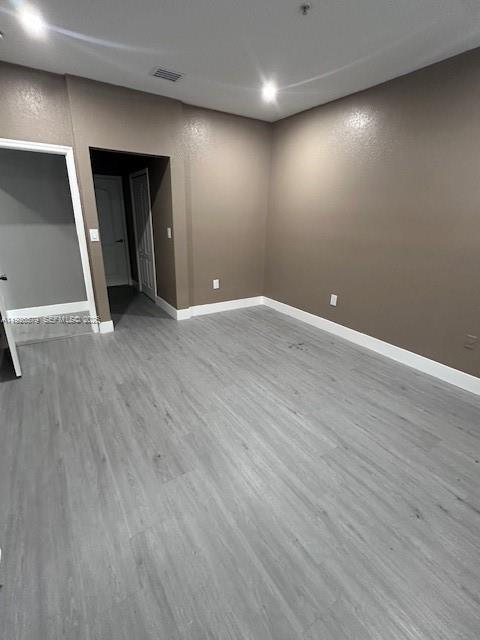 7100 Northwest 177th Street, Unit 100 Hialeah, FL 33015 - Photo 10 of 13 a view of an empty room