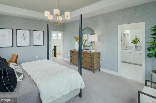 a living room with stainless steel appliances furniture a dining table and a window