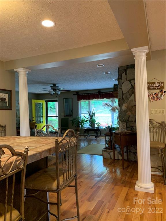 1115 Gouges Branch Road Leicester, NC 28748 - Photo 13 of 48 a view of a dining room with furniture window and outside view
