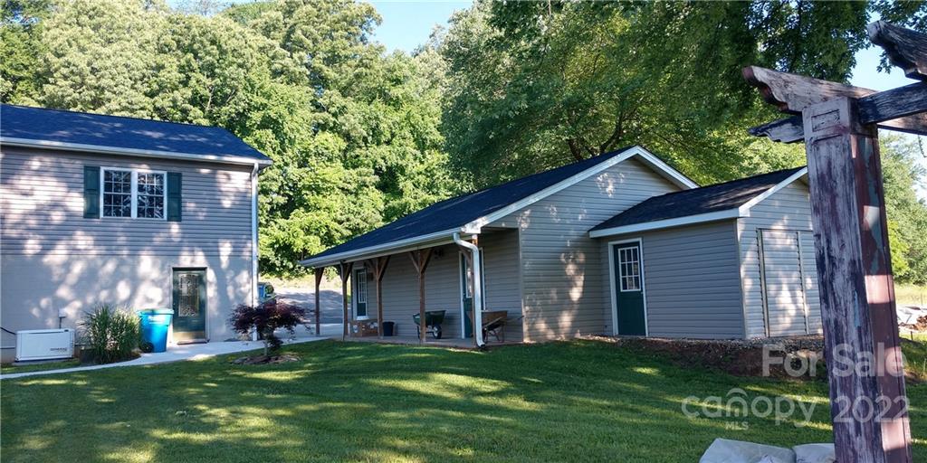 1115 Gouges Branch Road Leicester, NC 28748 - Photo 4 of 48 a view of a house with a yard