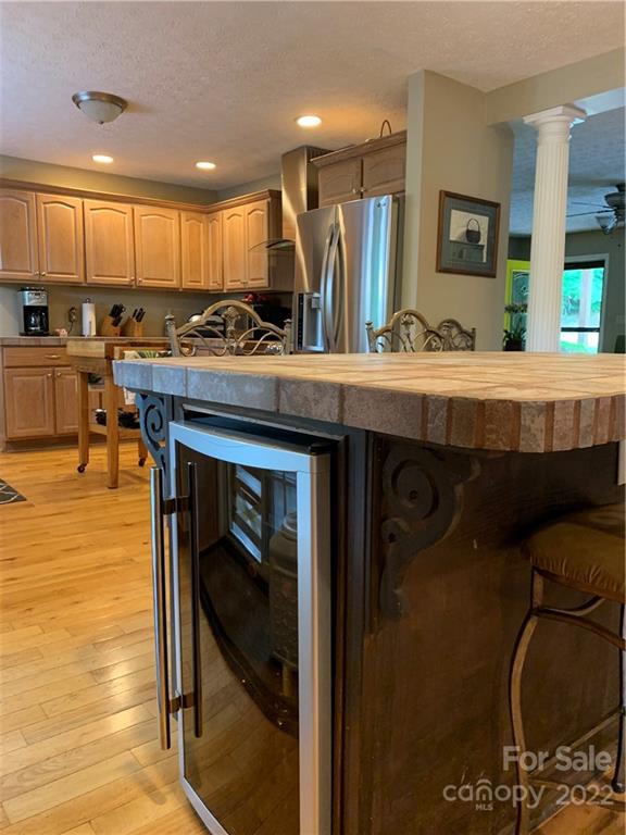 1115 Gouges Branch Road Leicester, NC 28748 - Photo 8 of 48 a kitchen with stainless steel appliances granite countertop a sink a stove and a refrigerator