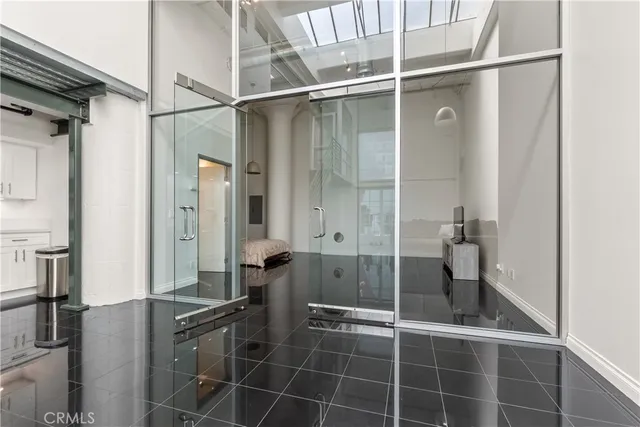 a kitchen with a sink a stove and a refrigerator