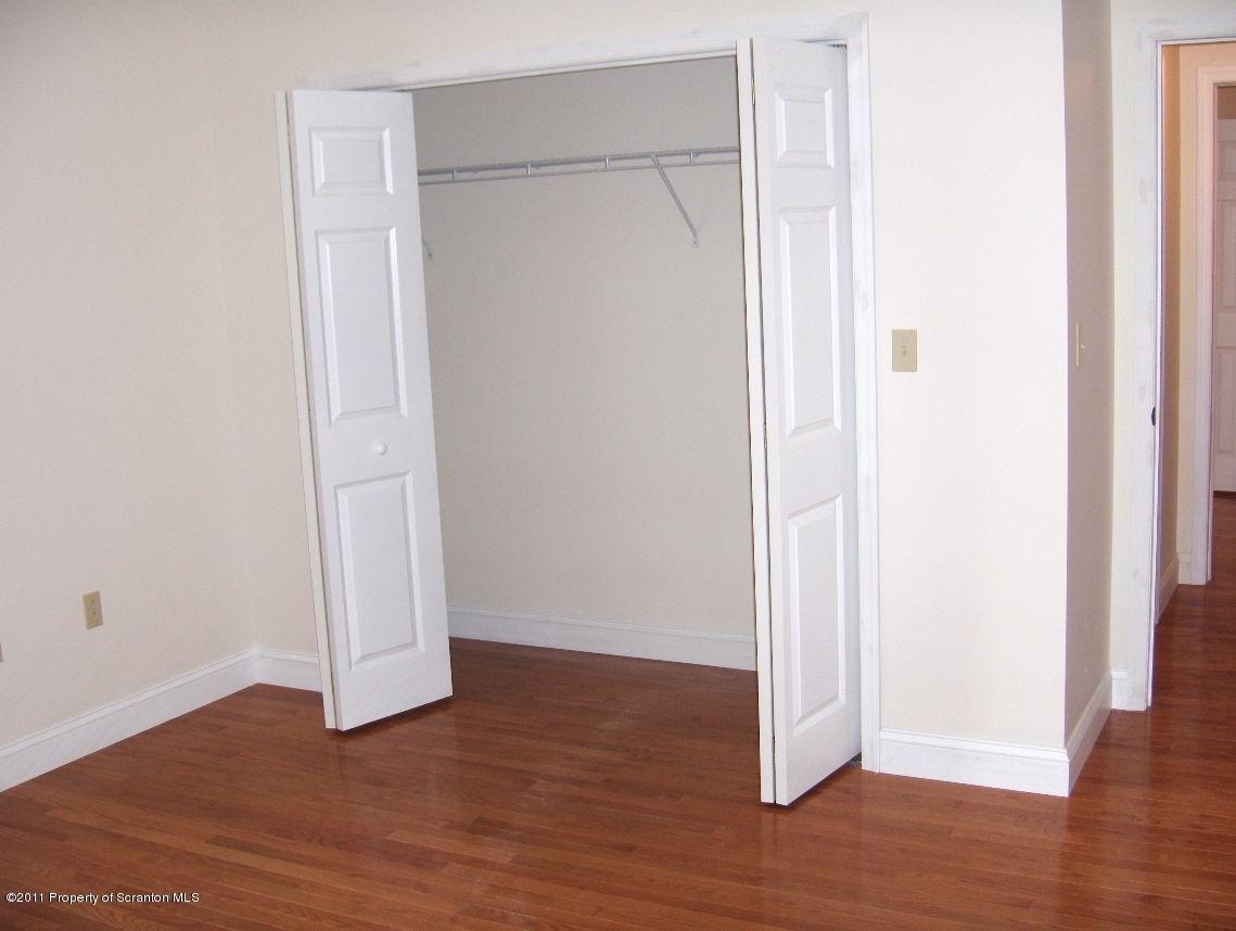 329 Penn Avenue Scranton, PA 18503 - Photo 4 of 5 a view of empty room with wooden floor