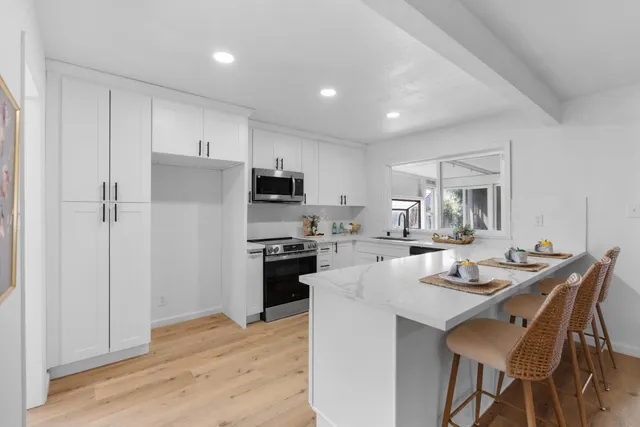a large kitchen with a lot of counter space