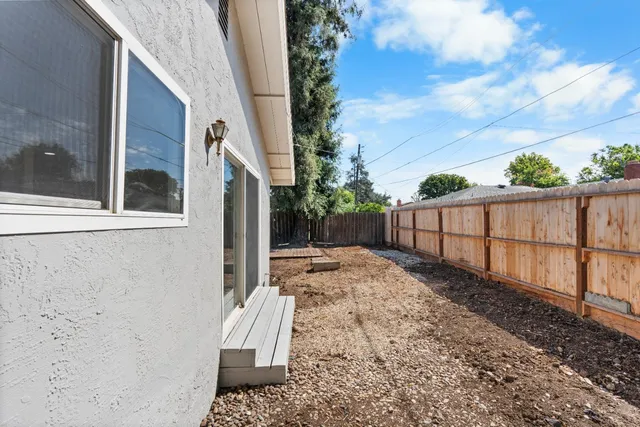 a street view with wooden fence