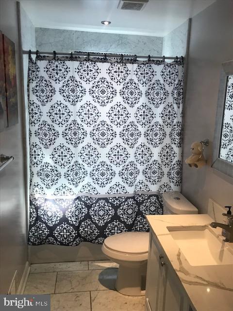 8406 Woodyard Road Clinton, MD 20735 - Photo 13 of 32 Full bath main floor with Italian marble