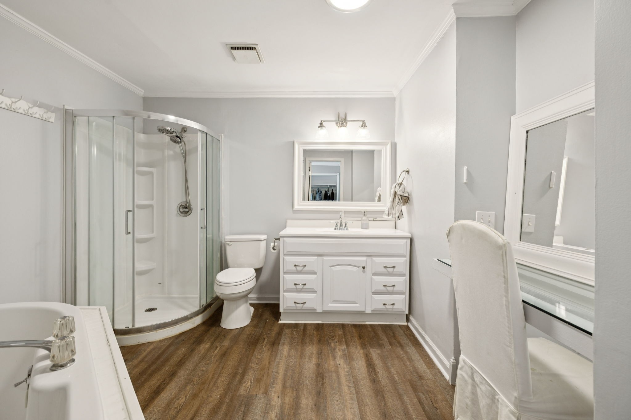 2311 Raspberry Lane Lebanon, TN 37087 - Photo 34 of 49 a bathroom with a granite countertop white toilet a sink and a large mirror