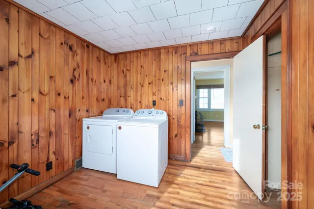 a view of a storage and utility room with a sink