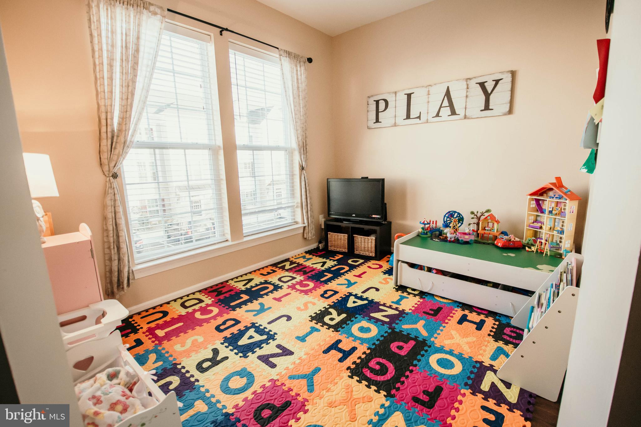 7454 Riding Meadow Way Manassas, VA 20111 - Photo 8 of 17 Play room/Main Level Den