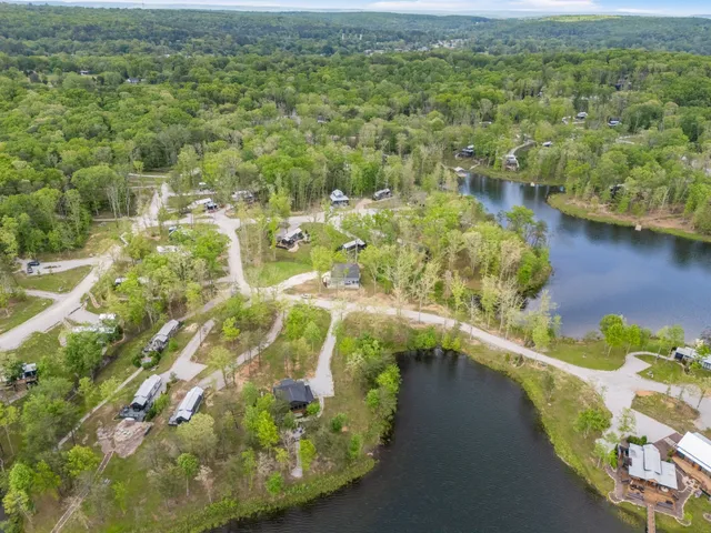 a view of a lake with a yard