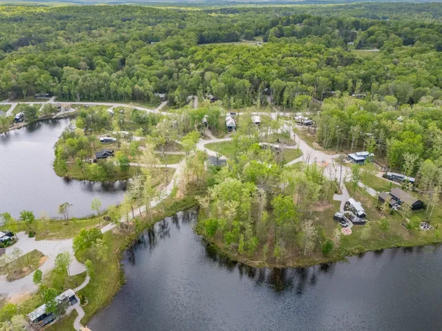 a view of a lake with a yard