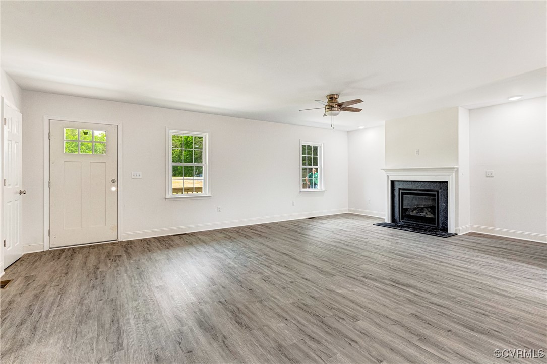 1684 Halls Store Road Mineral, VA 23117 - Photo 11 of 40 Unfurnished living room featuring a fireplace, bas