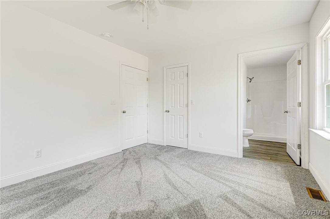 1684 Halls Store Road Mineral, VA 23117 - Photo 16 of 40 Unfurnished bedroom with baseboards, ensuite bathr
