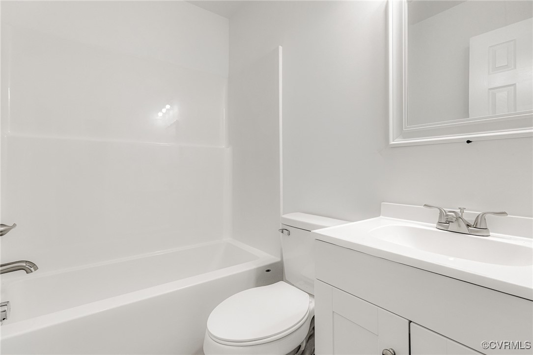 1684 Halls Store Road Mineral, VA 23117 - Photo 19 of 40 Bathroom featuring toilet, vanity, and shower / ba