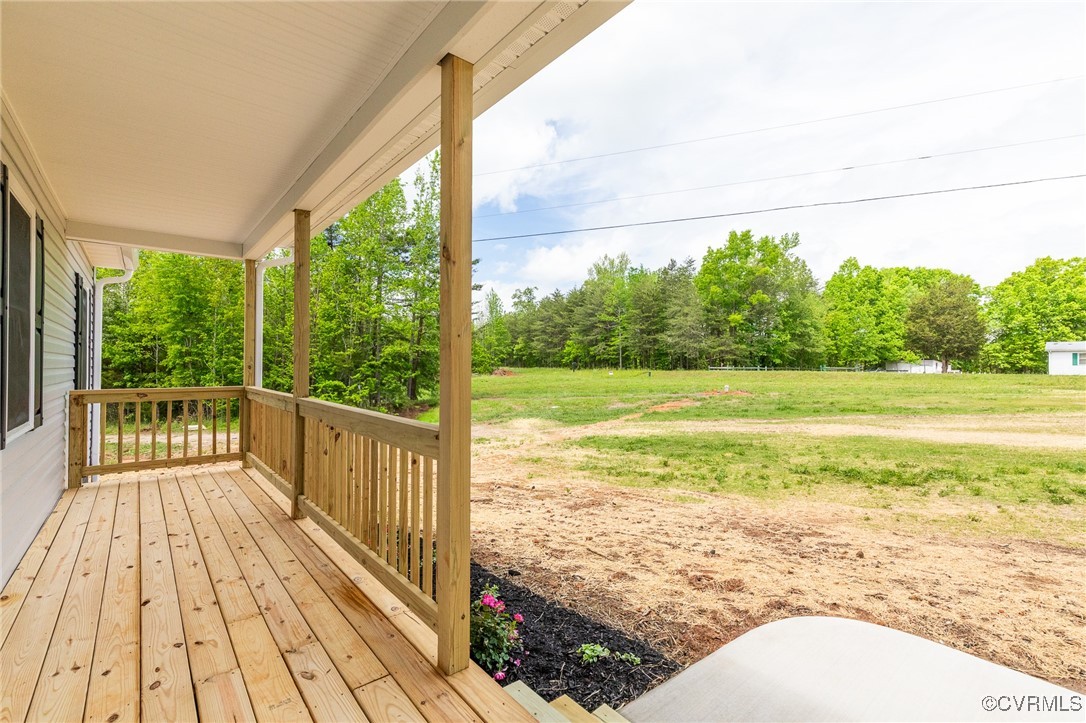 1684 Halls Store Road Mineral, VA 23117 - Photo 2 of 40 Wooden deck with a porch and a lawn