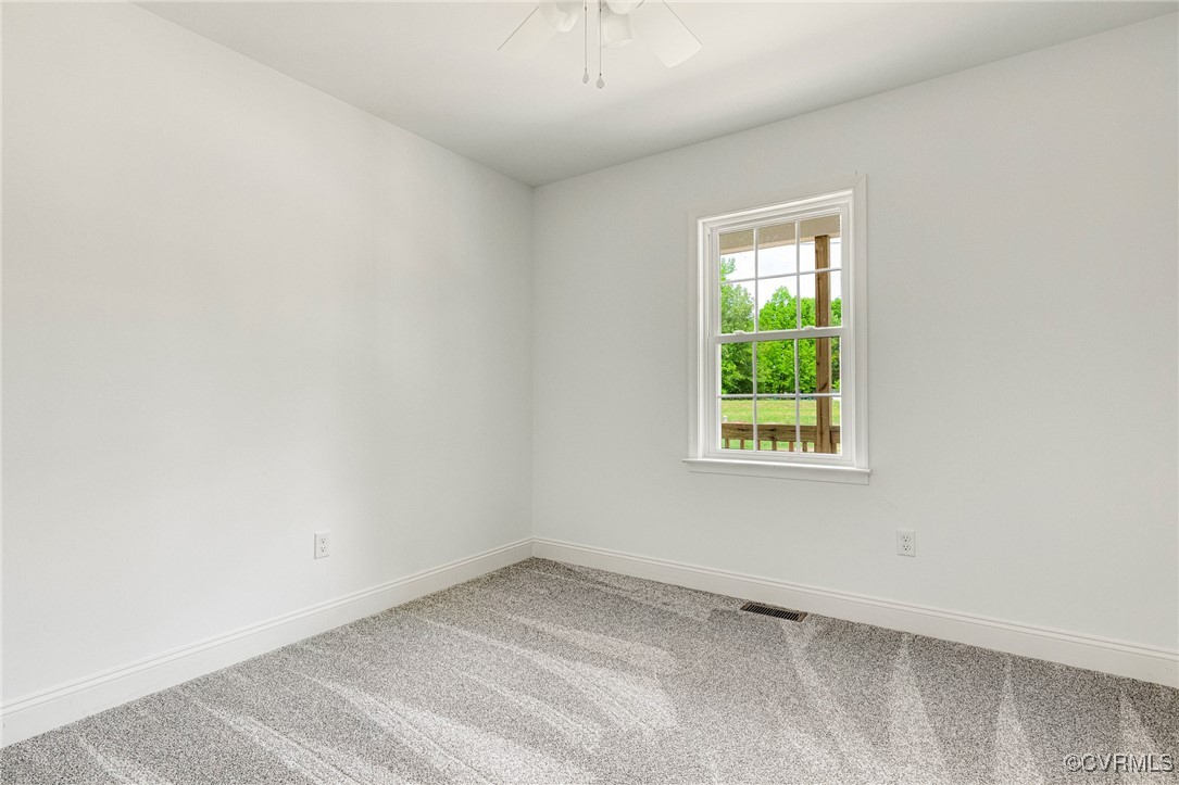 1684 Halls Store Road Mineral, VA 23117 - Photo 22 of 40 Carpeted empty room with visible vents, baseboards