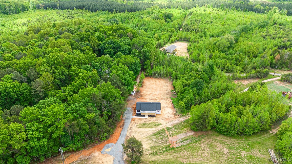1684 Halls Store Road Mineral, VA 23117 - Photo 26 of 40 Aerial view featuring a wooded view
