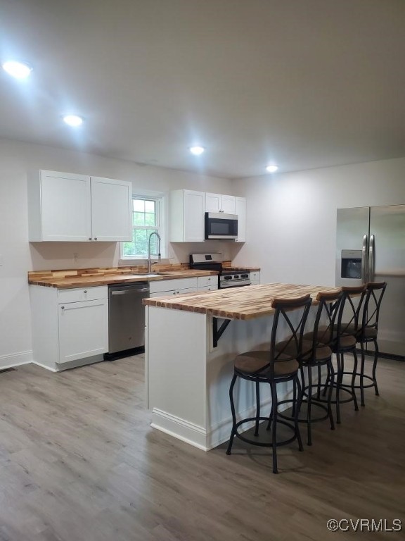 1684 Halls Store Road Mineral, VA 23117 - Photo 5 of 40 Kitchen with butcher block countertops, appliances