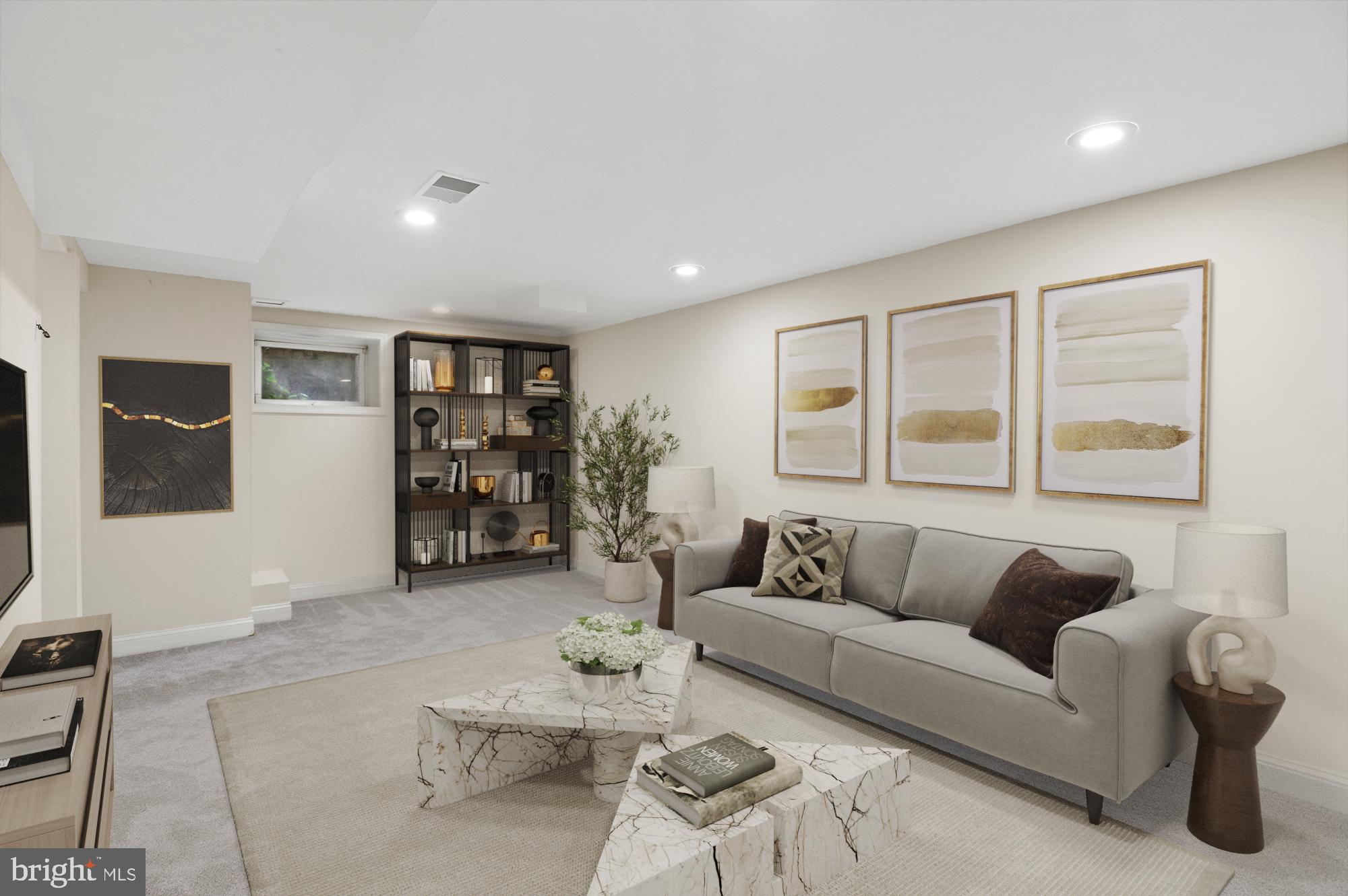 4849 Rodman Street Northwest Washington, DC 20016 - Photo 24 of 30 a living room with furniture and a flat screen tv