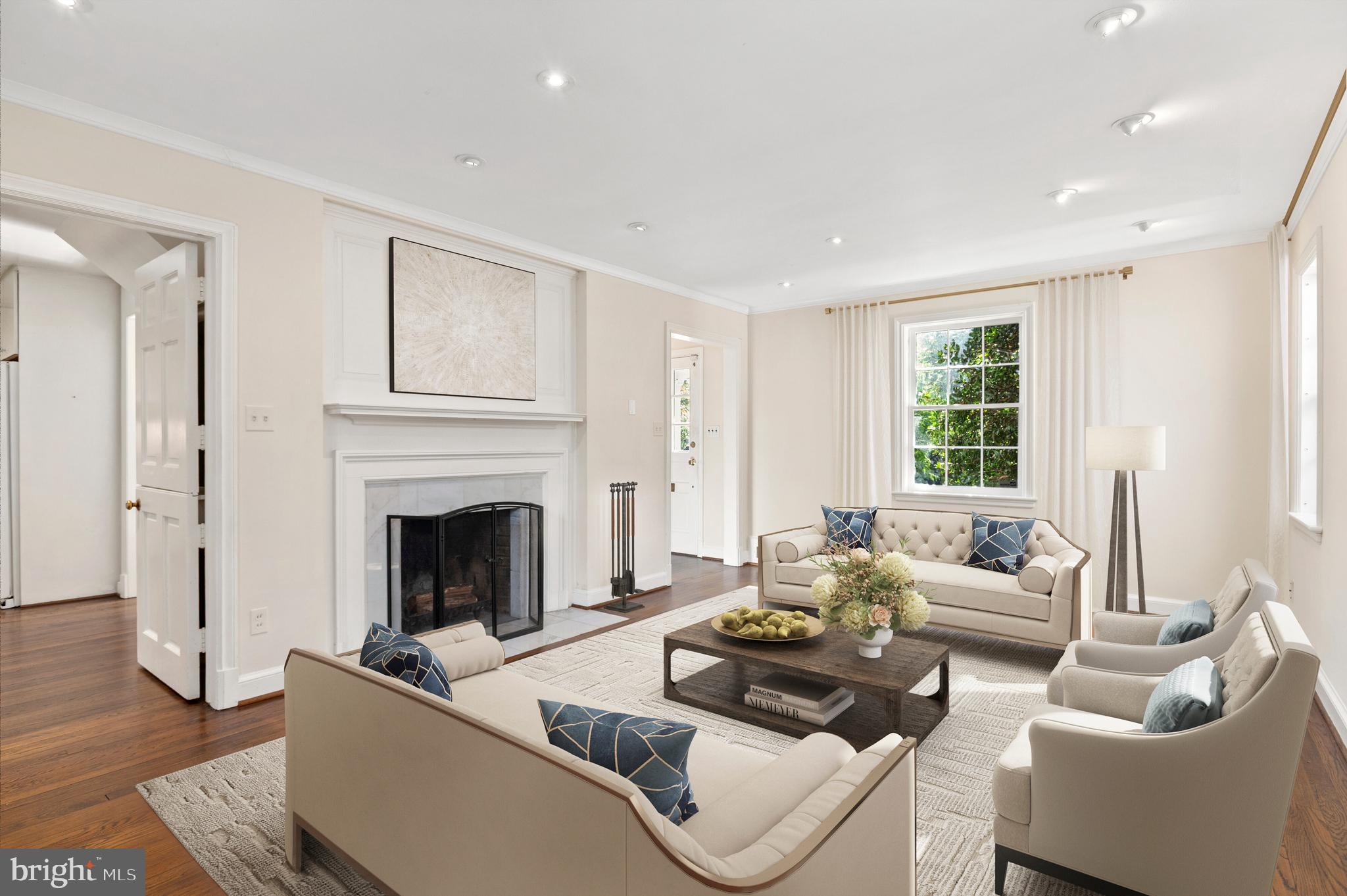 4849 Rodman Street Northwest Washington, DC 20016 - Photo 6 of 30 a living room with furniture and a fireplace