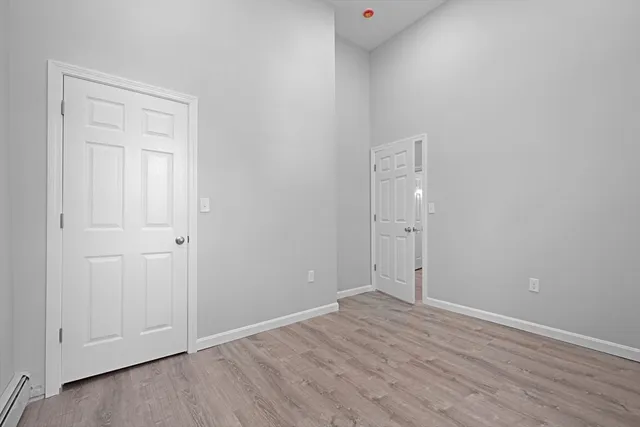 a bathroom with a toilet sink and shower