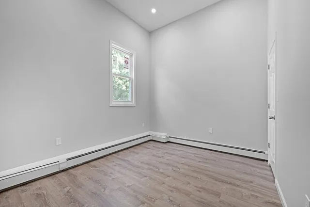 a view of a livingroom with gym equipment