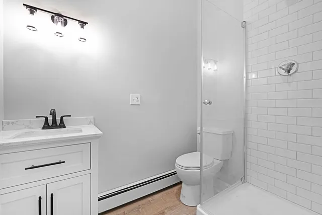 a view of a livingroom with furniture and a window