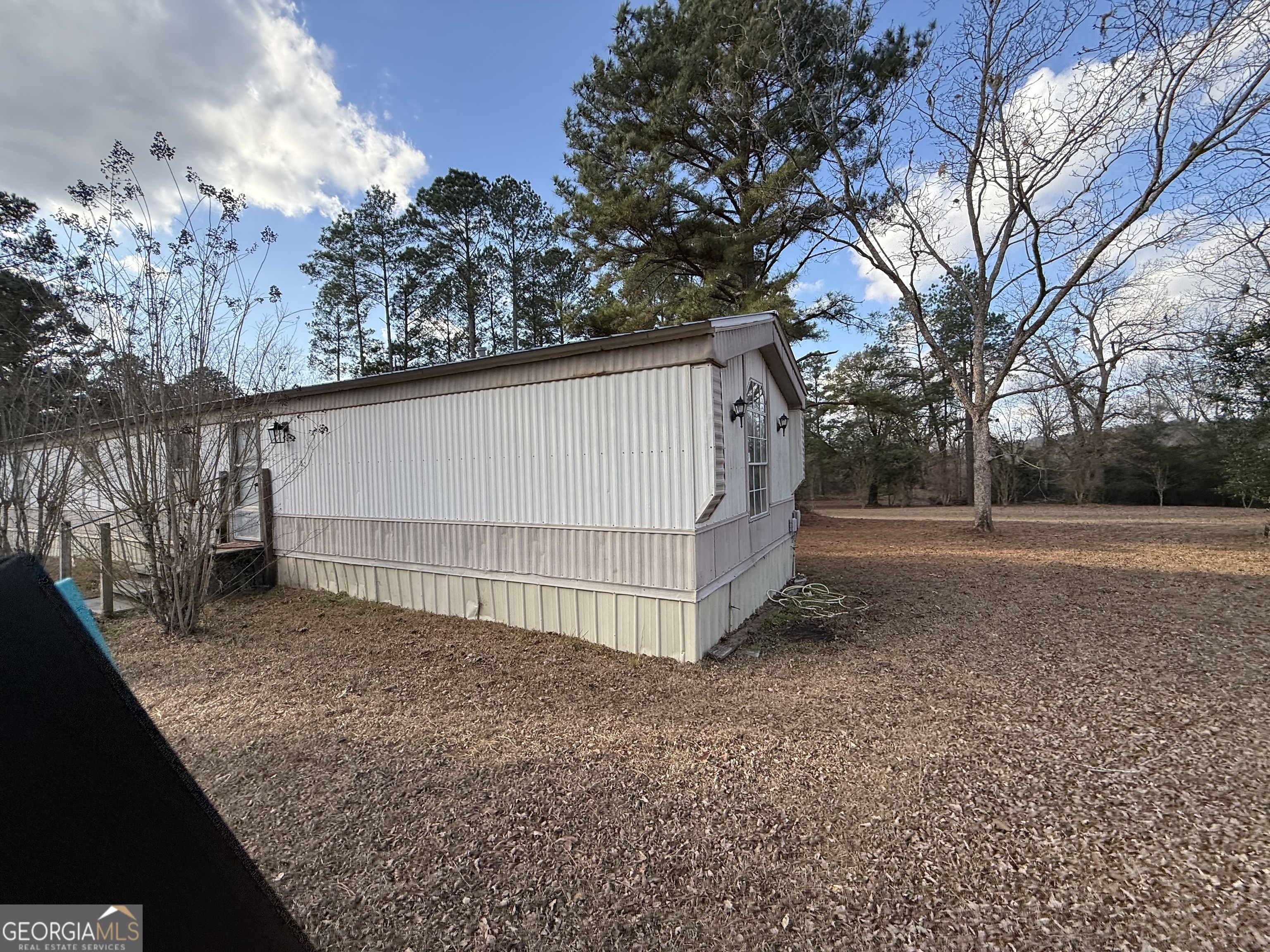 1775-1779 Payne Road Rentz, GA 31075 - Photo 37 of 51 a view of backyard and tree