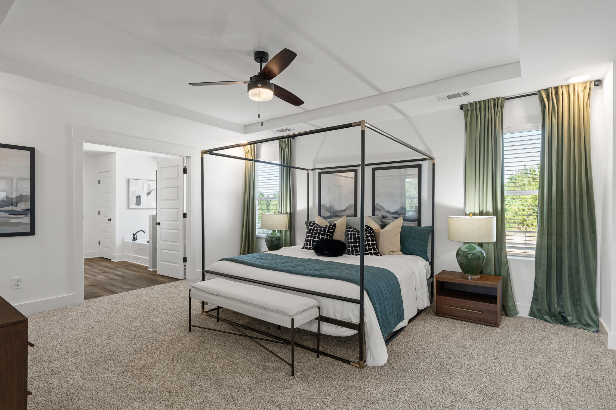 579 Bluebeech Street Freeport, FL 32439 - Photo 7 of 31 a bedroom with a bed lamp and a large window