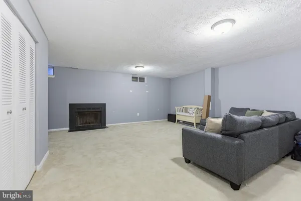 a living room with furniture and a couch