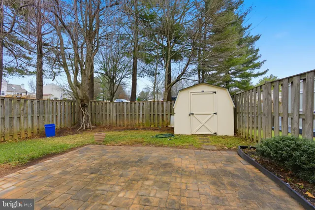 a view of backyard with green space