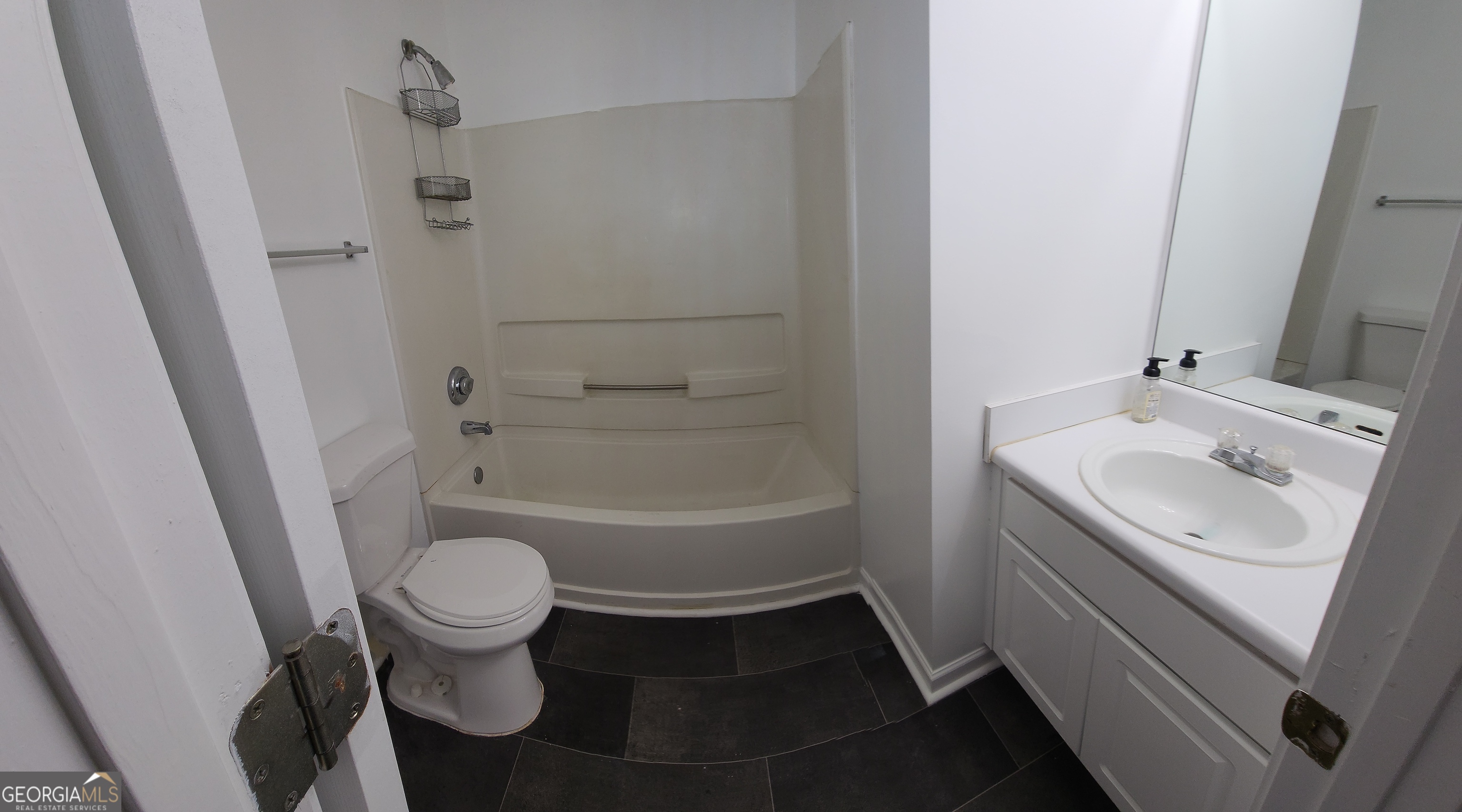 200 Glynn Addy Drive Stockbridge, GA 30281 - Photo 16 of 28 a bathroom with a sink toilet and shower
