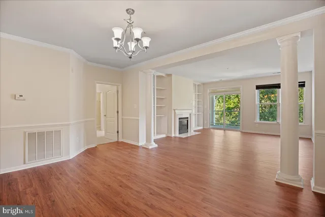 a view of livingroom with window and hardwood floor