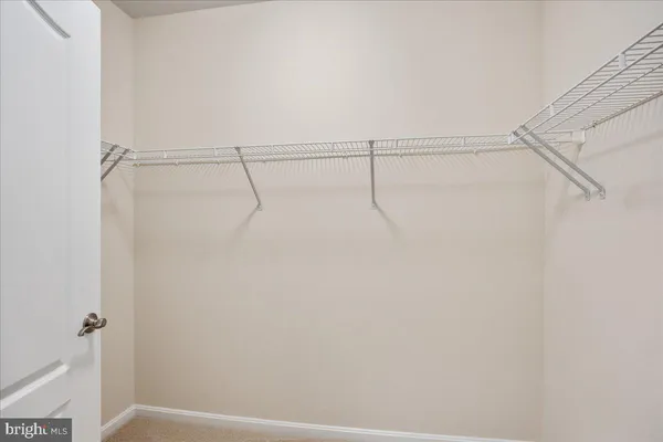 a view of small space with racks on the wall