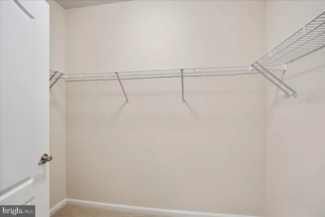 a view of small space with racks on the wall