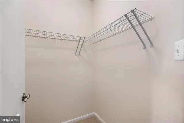 a view of a room with racks on the wall