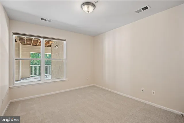 an empty room with a window