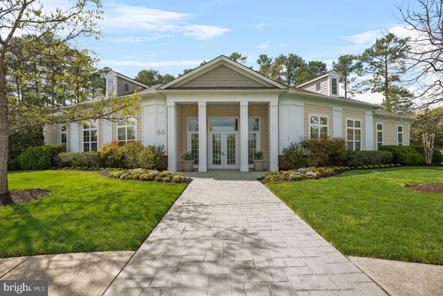 front view of a house and a yard