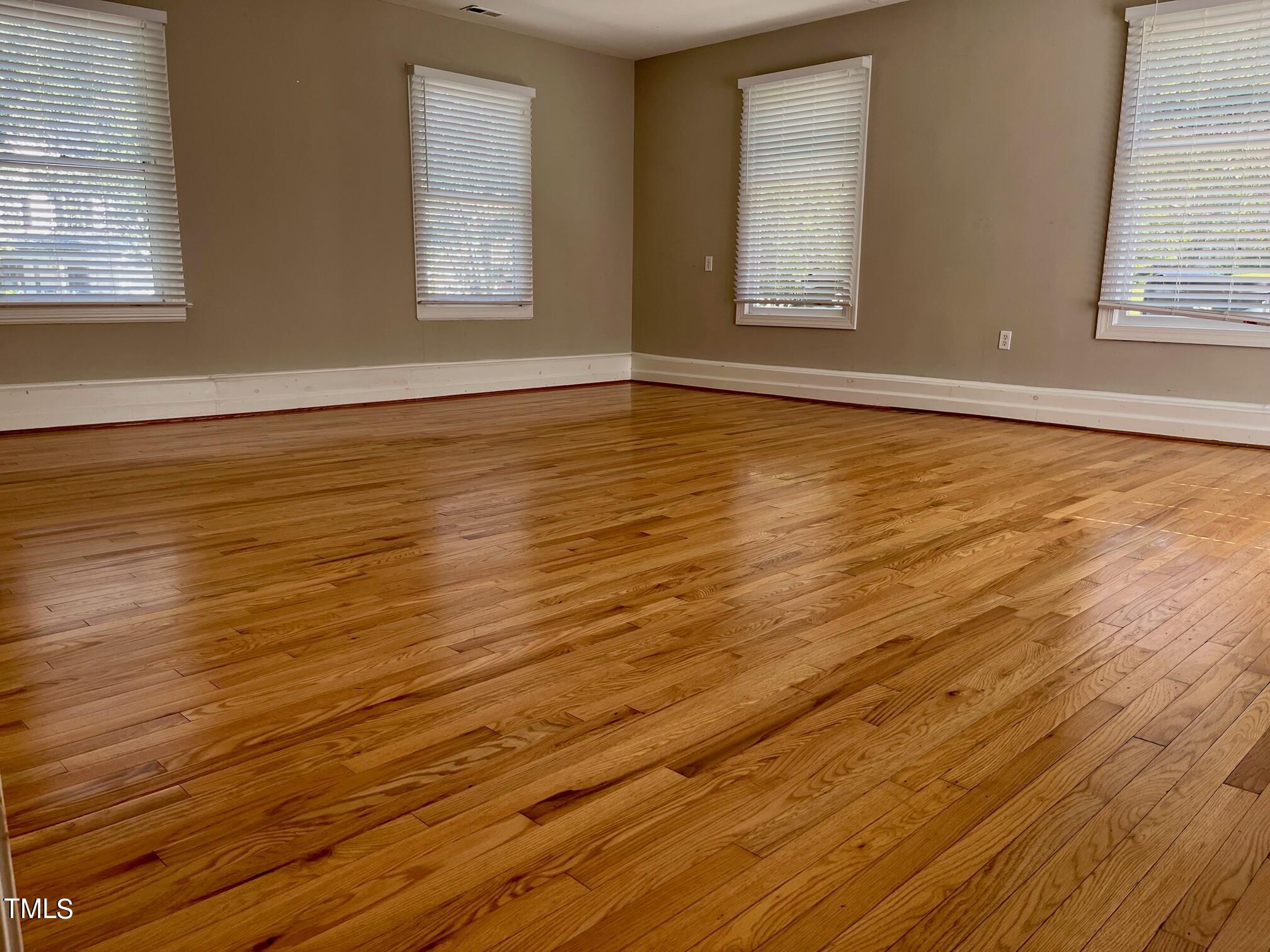5205 Bakers Mill Road Durham, NC 27707 - Photo 12 of 21 Rec Room with hardwood floors