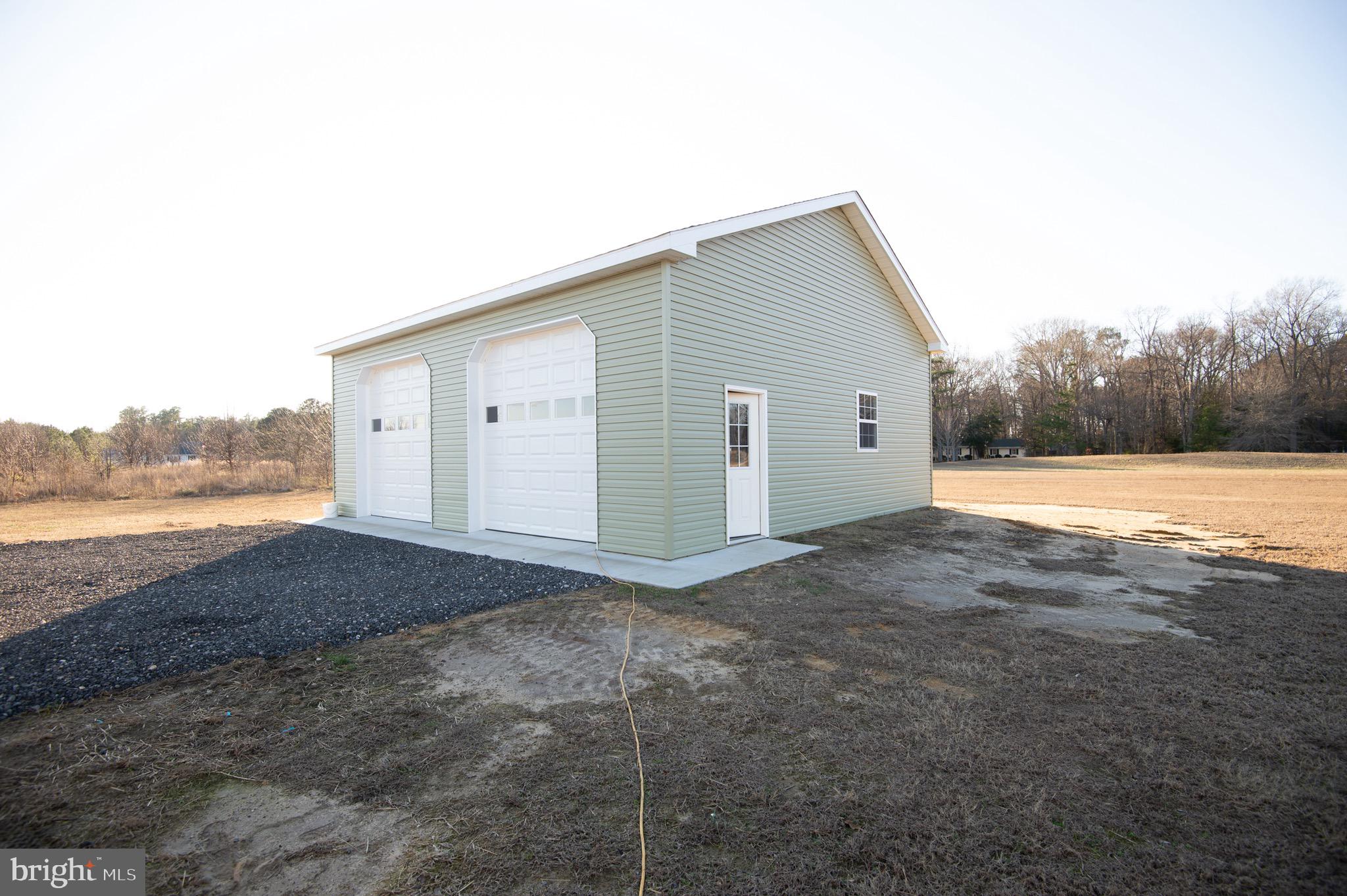 6806 Wrights Rest Road Hurlock, MD 21643 - Photo 16 of 19 Large outbuilding -30 x 32 with 12 "