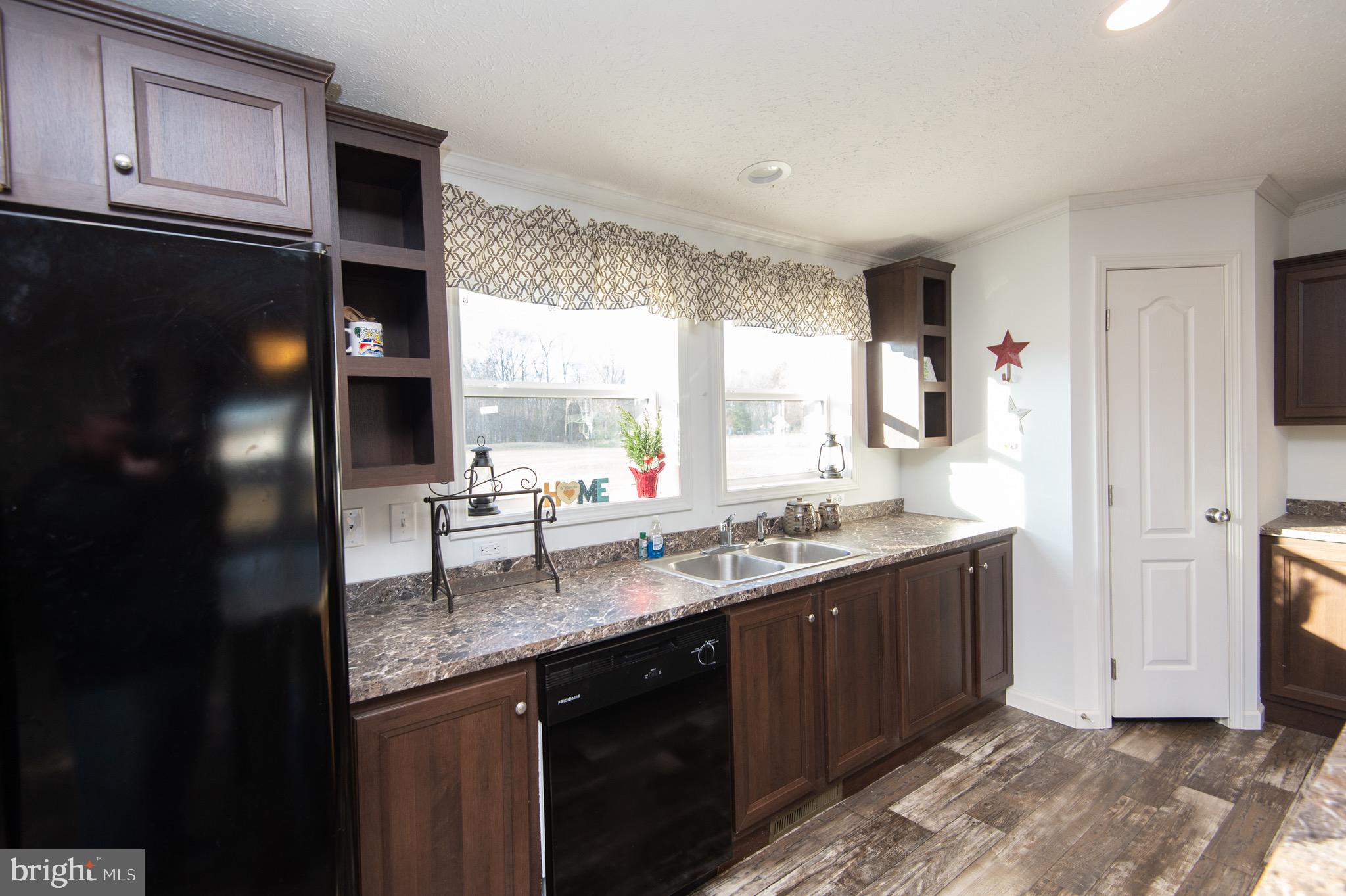 6806 Wrights Rest Road Hurlock, MD 21643 - Photo 4 of 19 Kitchen- loads of cabinets plus a pantry