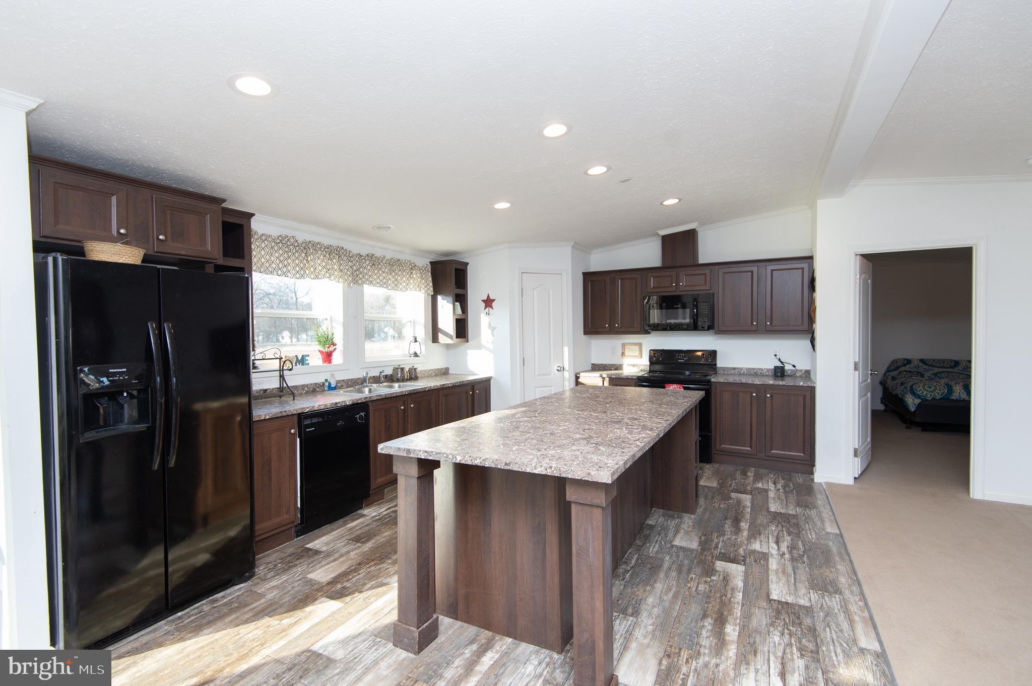 6806 Wrights Rest Road Hurlock, MD 21643 - Photo 8 of 19 Kitchen with large bar - great for entertaining!