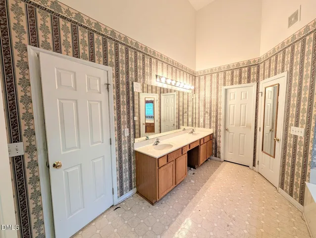 a bathroom with a bathtub and shower