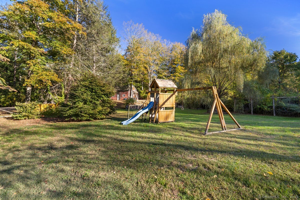 1166 Old Racebrook Road Woodbridge, CT 06525 - Photo 23 of 29 a view of a park with a slide