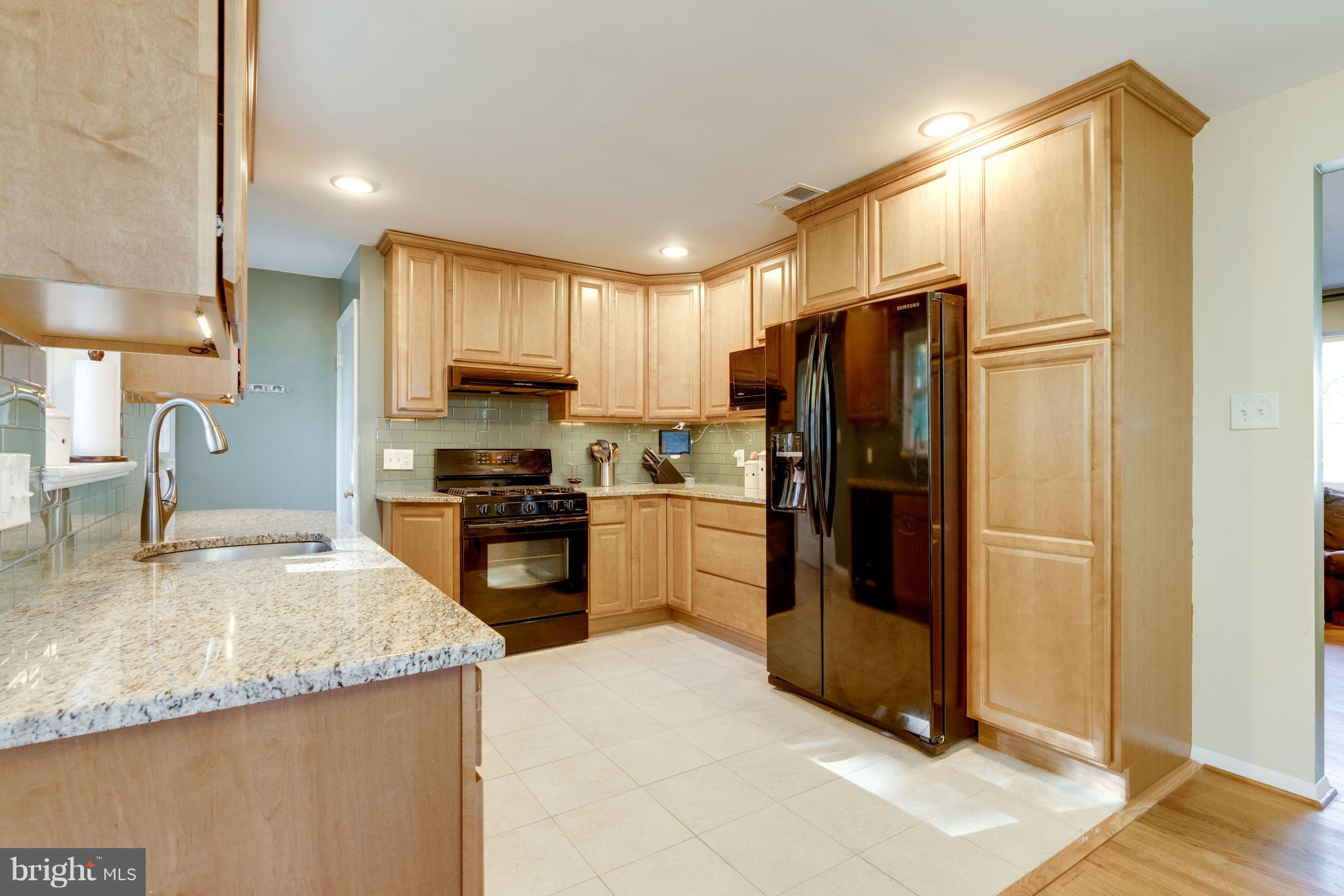 7416 Gary Street Springfield, VA 22150 - Photo 3 of 26 Tall Wood Cabinetry & Pantry, Ceramic Tile!