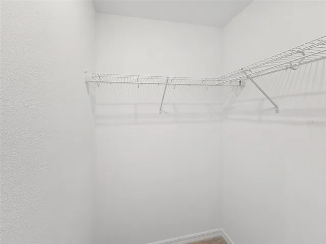 a view of small space with racks on the wall