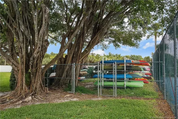 a view of swimming pool with a yard