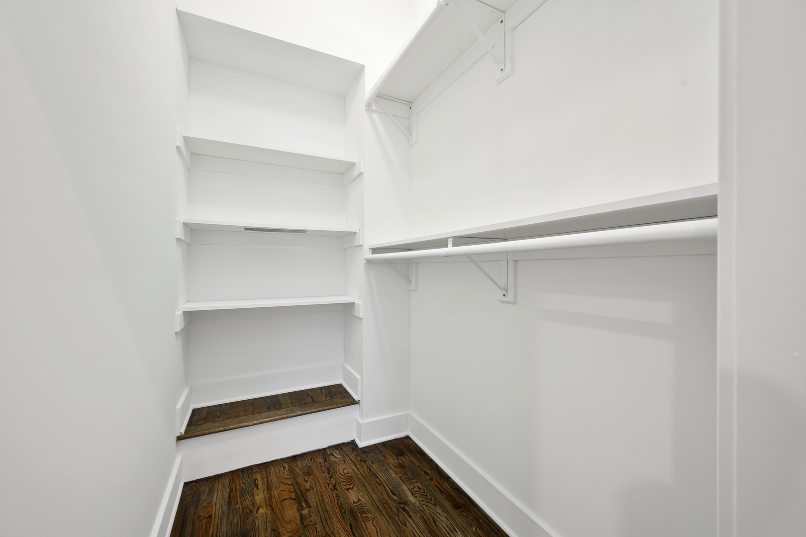 1015 West Lake Street, Unit 2E Chicago, IL 60607 - Photo 12 of 19 a view of walk in closet with empty racks